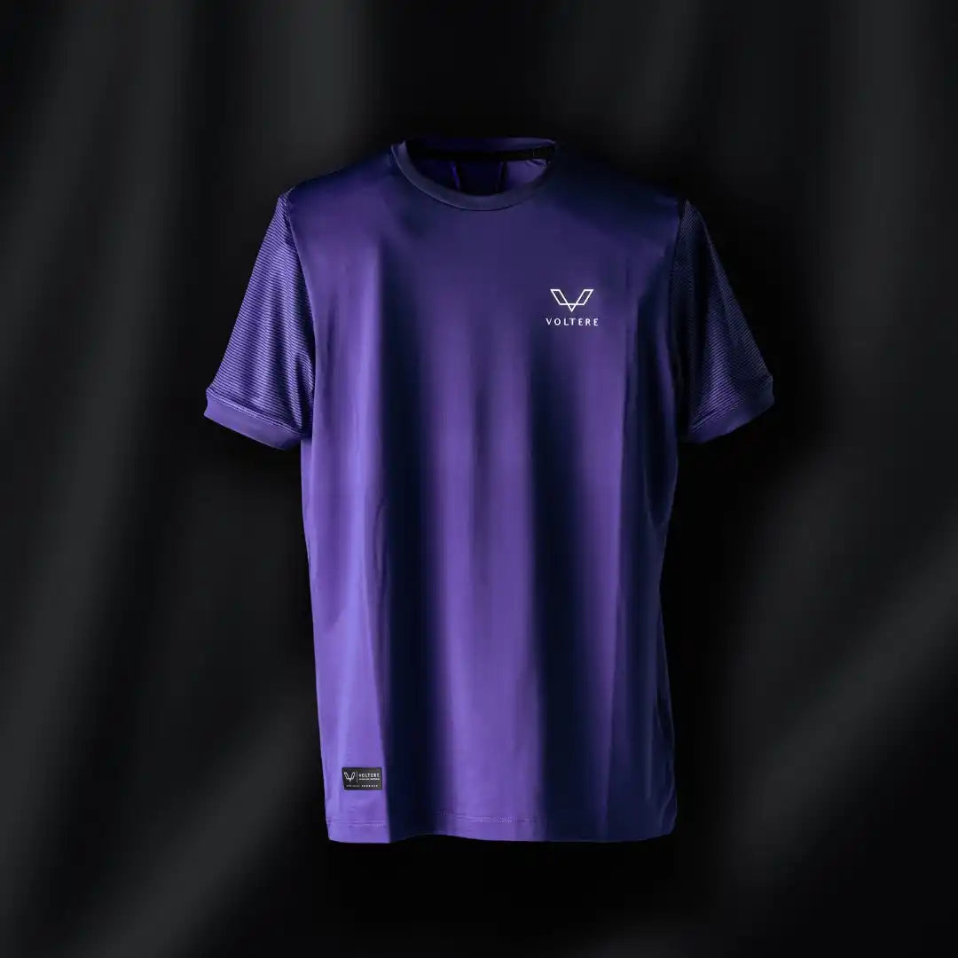 Purple t-shirt with a small logo on the chest.